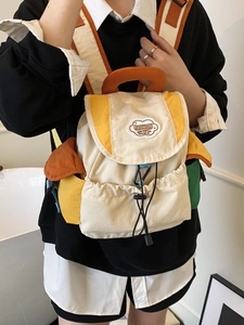 Retro color-block drawstring backpack for women featuring a minimalist nylon design