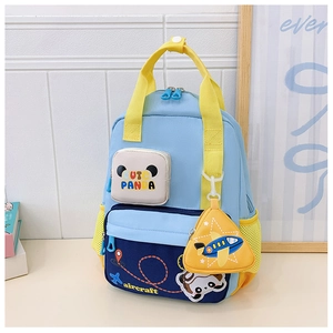 Detail view of cartoon airplane schoolbag with cute panda patch and a mini yellow coin purse