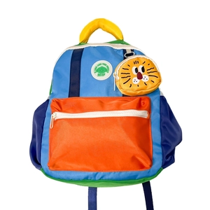 Colorful multi-color patchwork children's backpack with cute lion charm and alien patch