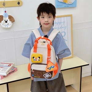 Cute airplane and panda themed kids backpack in cream canvas with vibrant orange accents
