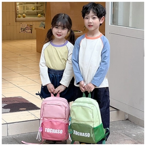 Close-up of stylish contrast color kids backpacks with large capacity and mesh pockets