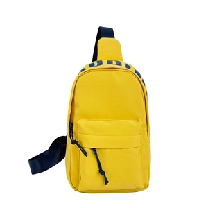 Fashionable bright yellow nylon crossbody chest bag with blue UMA logo for kids travel
