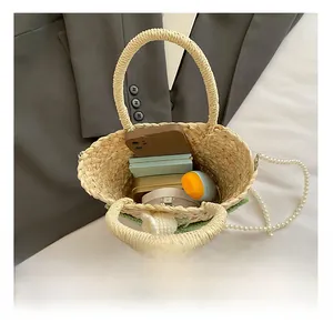 Top view of woven bucket bag interior showing capacity for phone and cosmetics