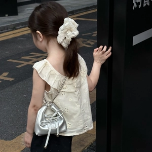 Silver metallic PU crossbody bag with bow and chain for stylish girls outfit