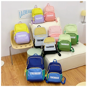 Detail shot of colorful school backpacks in multiple sizes and vibrant contrast colors