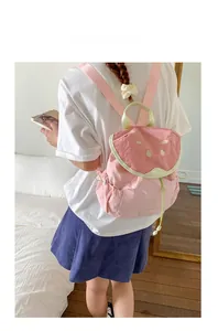 Pink watermelon themed kids backpack with cute fruit pattern and drawstring closure
