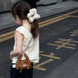 Girl's brown leather mini chain bag with cute bow and matching lace hair scrunchie