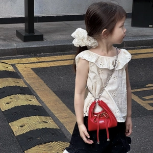 Mini red leather girl's crossbody bag with chain strap and cute bow decoration