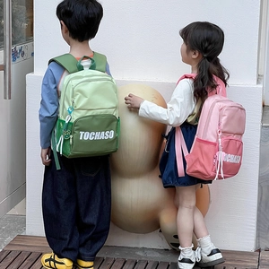 Kids color-block backpack with large capacity and cute bear charm in green and pink
