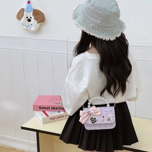 Sweet purple tweed mini bag with pearl handle and pink bow for young girls