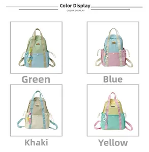 Detailed view of color-blocked school backpacks in green, blue, khaki and yellow options