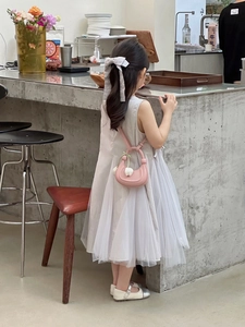 Pink crescent mini bag for kids with white tulip charm and grey tulle dress detail
