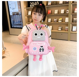 Detail showing the pink robot kid backpack with side wings and 3D decorative antenna