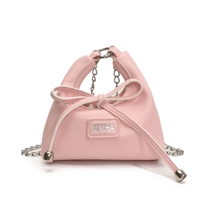 Pink mini crossbody bag for girls with bow decoration and silver chain strap