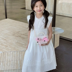 Elegant white sleeveless girl's dress with eyelet embroidery and pearl chain handbag