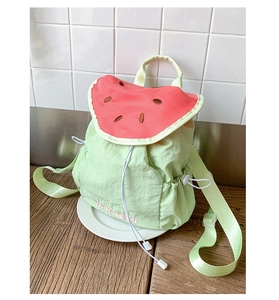 Close-up of cute watermelon children backpack with drawstring and embroidery detail