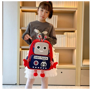 Close-up of red and blue robot-themed kids backpack with a 3D cartoon design