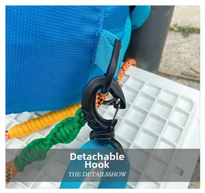 Macro shot of durable detachable plastic swivel hook on blue nylon outdoor kids travel bag