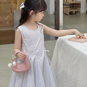 Pink crescent handbag for kids with tulip charm and minimalist solid color design