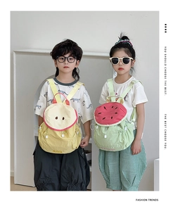 Kids colorful fruit backpacks featuring 3D apple and watermelon drawstring designs