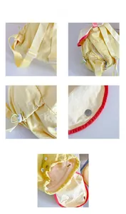 Close-up of yellow nylon kids backpack showing drawstring, magnetic buckle and inner pocket
