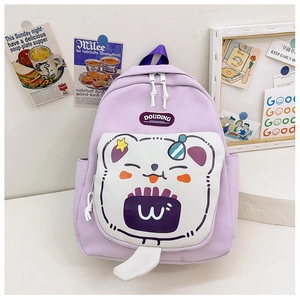 Detail of light purple school backpack with cute bear face pocket and star decorations