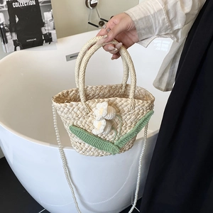 Handmade woven floral straw shoulder bag with elegant pearl strap for summer beach vacation