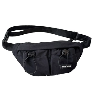 Minimalist black kids chest bag with adjustable strap and dual drawstring front pockets