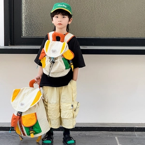 Kids colorful patchwork canvas backpack with orange and green panels for school children