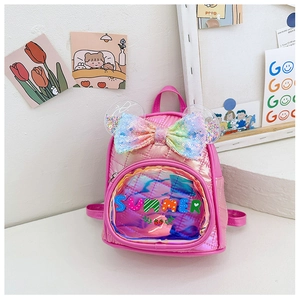 Macro detail of kids pink backpack showing sequin bow and holographic Summer strawberry pocket