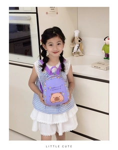 Kid's purple backpack featuring a cute cartoon capybara print and comfortable handle