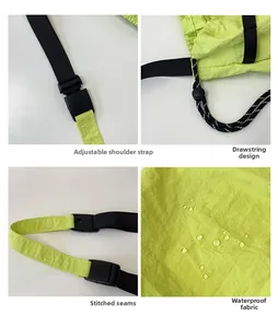Detail of adjustable strap and drawstring on green waterproof nylon kids crossbody bag