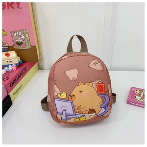 Detail view of pink Capybara backpack with cartoon illustration and durable straps