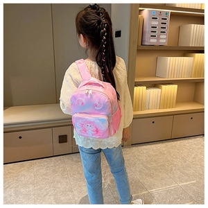 Detail of pink gradient mermaid backpack with side mesh pocket for children's water bottle