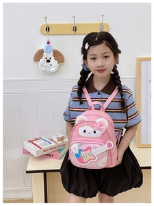 Pink sequin guitar backpack featuring cartoon cat patterns and bow detail for girls