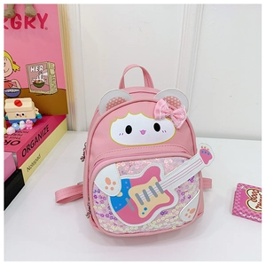 Detail of pink sequins cat playing guitar on a cute glitter backpack for girls