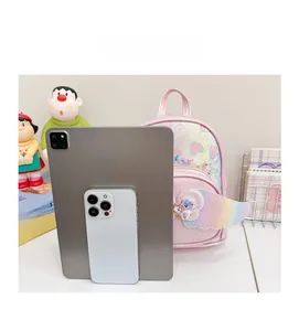 Toddler mini backpack size comparison with an iPad and phone showing pink glitter design