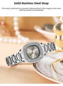 Close-up of luxury women's watch with crystal bezel and solid stainless steel band