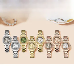 Luxurious quartz watches with diamond bezels and multicolored dials on warm background