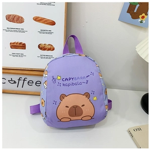 Detail of purple children backpack with cute cartoon Capybara print and adjustable straps