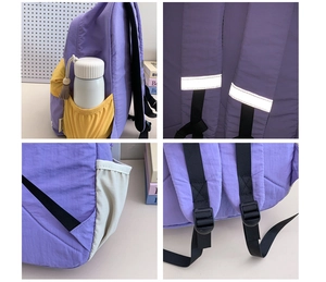 Detail of purple school backpack showing reflective safety straps and side mesh pockets