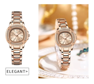 Macro detail of rose gold quartz watch with pavé diamonds on a porcelain dish