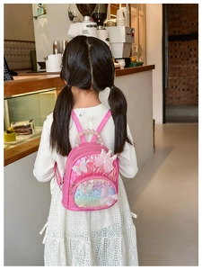 Pink kids sequin backpack with butterfly accents and elegant pearl handle detail