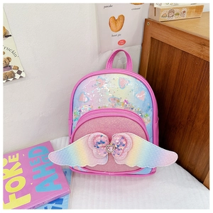 Detailed view of pink sequin kids backpack with rainbow angel wings and heart jewel