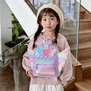 Quilted lavender kids backpack with rainbow sequin wings and glitter heart bow