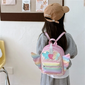 Pink sequin unicorn backpack for kids featuring glitter wings and quilted diamond pattern
