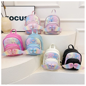 Collection of kids backpacks with shiny sequin hearts and colorful gradient wings