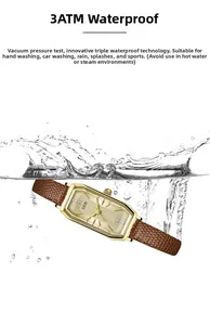 Detailed view of the vintage rectangular gold watch submerged in water showing 3ATM resistance