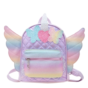 Quilted purple unicorn backpack for kids with rainbow wings and sequin bow accent