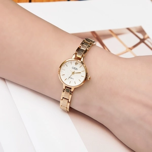 Elegant rose gold chain link watch for women with round white dial and quartz movement